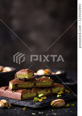 Dubai chocolate with kadayif pistachio filling 123910993