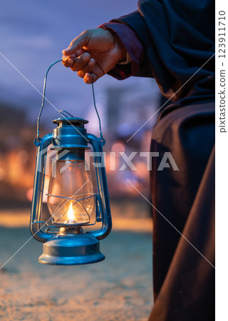 A traditional Saudi Arabian lantern glows in the night 123911710