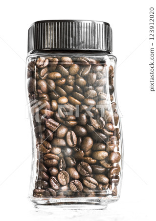 Jar with coffee grains Jar with coffee grains 123912020