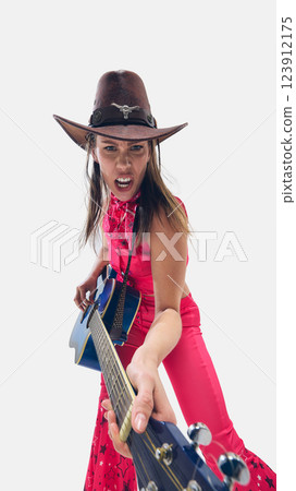 Energetic woman, musician in cowboy hat playing blue guitar with fierce passion against white background. 123912175