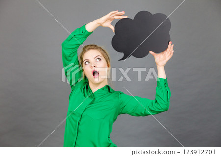 Shocked business woman with thinking bubble Shocked business woman with thinking bubble 123912701