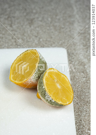 Aging and Spoiled Lemon with Mold Growth Aging and Spoiled Lemon with Mold Growth 123914037