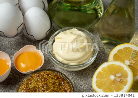 Traditional mayonnaise sauce among the ingredients eggs, butter, mustard and lemons. 123914041