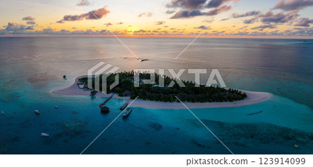 Aerial views of Velavaru Island at sunset in Maldives Aerial views of Velavaru Island at sunset in Maldives 123914099