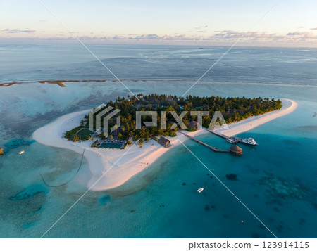 Aerial views of Velavaru Island at sunset in Maldives Aerial views of Velavaru Island at sunset in Maldives 123914115
