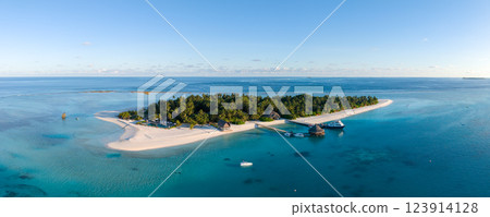 Aerial views of Velavaru Island at sunset in Maldives 123914128