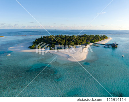 Aerial views of Velavaru Island at sunset in Maldives Aerial views of Velavaru Island at sunset in Maldives 123914134