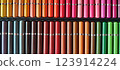 A large set of colored pencils. 123914224