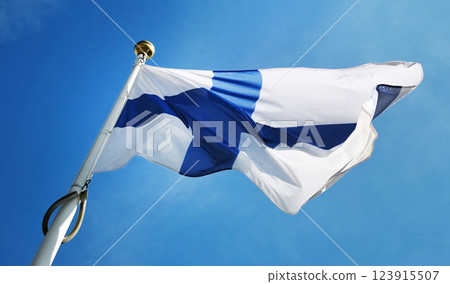 National Flag Of Finland Waving Against The Sky Background On A Pole 123915507
