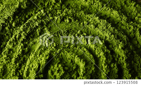 Matcha green tea powder top close up view Matcha green tea powder top close up view 123915508