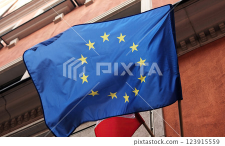The Eu'S Main Symbol, The European Union Flag, Waving In The City The Eu'S Main Symbol, The European Union Flag, Waving In The City 123915559