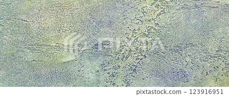 Old light green and blue wall background covered with shabby peeling plaster. Texture vintage backdrop 123916951