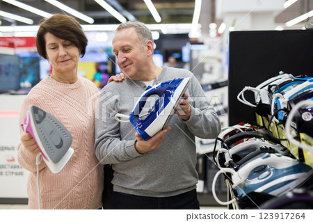 European spouses of mature age choose an iron European spouses of mature age choose an iron 123917264