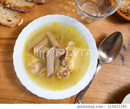 Chicken soup with pasta served in bowl 123917385