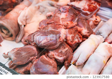 Pork laid out in showcase of butcher shop 123917580