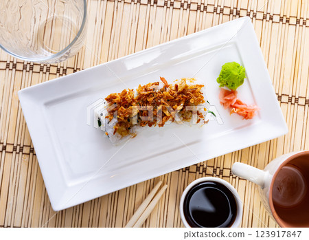 Curry roll - rolls with avocado, crab, cucumber and fried onion. Japanese traditional food Curry roll - rolls with avocado, crab, cucumber and fried onion. Japanese traditional food 123917847