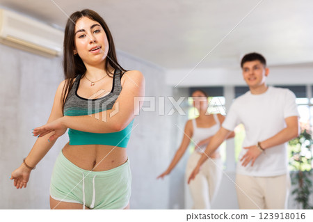 Group of young women and young guy dance contemporary 123918016