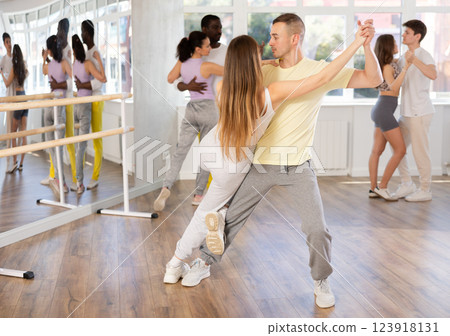 Young man and woman dancing latin dances Young man and woman dancing latin dances 123918131