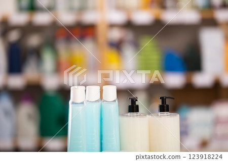Close view of shampoo and shower gel in supermarket 123918224