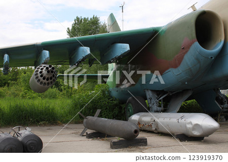 Aircraft Armament Near War Plane At Military Base Aircraft Armament Near War Plane At Military Base 123919370