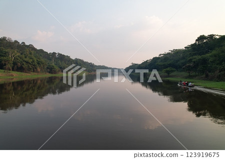 River journey through lush rainforest in a remote area near Amazon River journey through lush rainforest in a remote area near Amazon 123919675