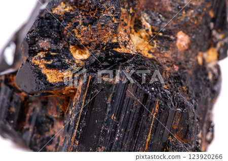 macro mineral stone sherle, schorl, black tourmaline on white background 123920266