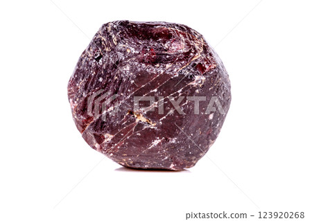 Macro of a mineral garnet stone on a white background 123920268