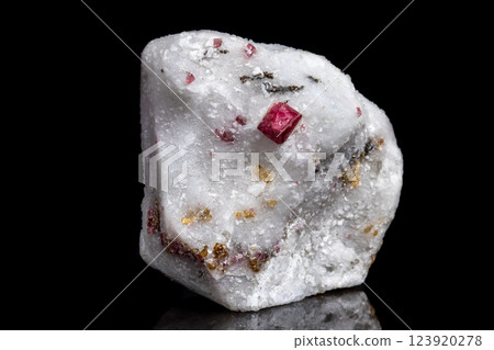Macro mineral stone Spinel on a black background 123920278