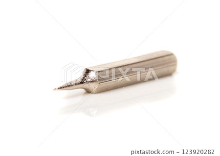 A set of different attachments for a head screwdriver with a screwdriver on a white background A set of different attachments for a head screwdriver with a screwdriver on a white background 123920282