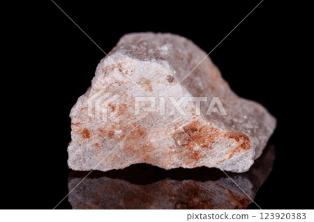 Macro mineral stone red gypsum on black background Macro mineral stone red gypsum on black background 123920383