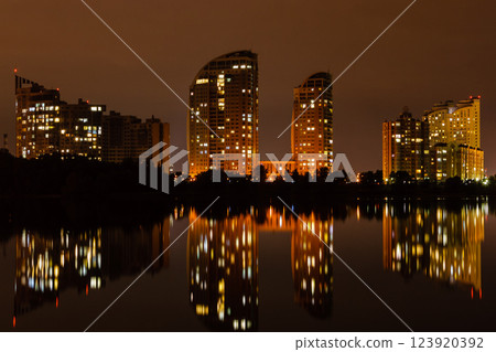 night city with reflection of houses in the river night city with reflection of houses in the river 123920392