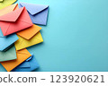 Colorful envelopes on a pastel background 123920621