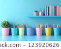 A creative and organized workspace with pastel-colored pen holders, books, and decorative elements 123920626