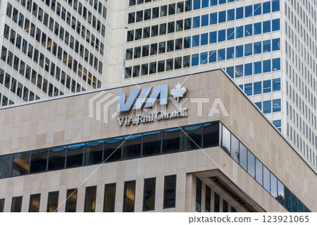 Montreal, Quebec, Canada - August 2 2021 : Close up of VIA Rail Canada sign. VIA Rail Canada Head Office. 123921065