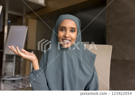Arabian businesswoman in hijab lead online conference with client 123922054