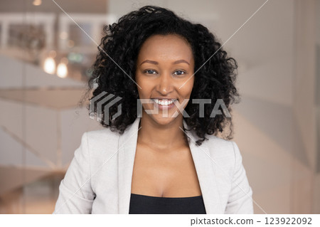 Positive beautiful African American businesswoman looking at camera 123922092