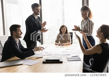 Group of professionals clapping hands, encouraging, motivate each other 123923683