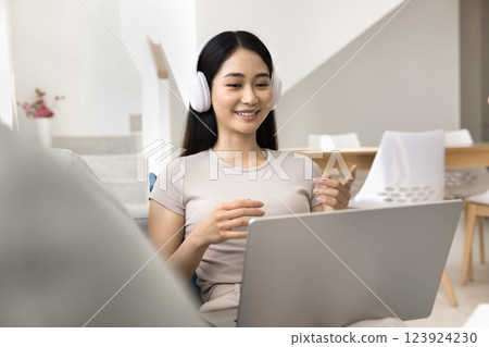 Asian woman lead talk using laptop and videocall application 123924230