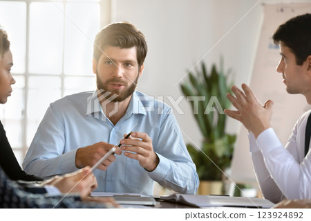 Boss share strategy, corporate goals, solutions during briefing with staff 123924892