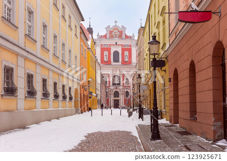 Fara Church Facade and Old Street in Poznan, Poland 123925671
