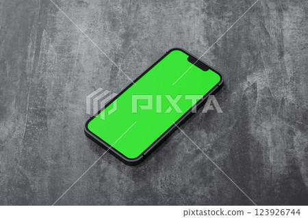 Smartphone cellphone with laptop computer and accessories on the floor, 3D rendering. Smartphone cellphone with laptop computer and accessories on the floor, 3D rendering. 123926744