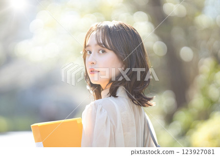 Female college student walking on campus Female college student walking on campus 123927081