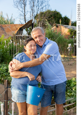 Portrait of happy couple on their farm 123928688
