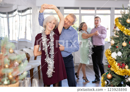 Elderly man and elderly woman dance waltz 123928898