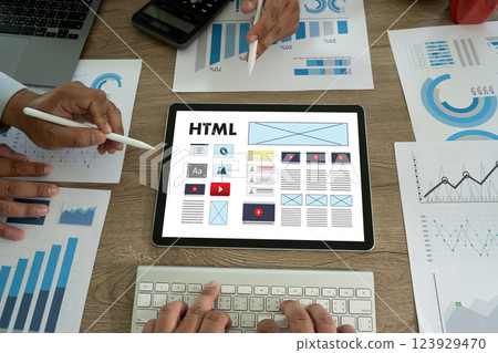 A creative person works on web design  to build responsive websites and digital applications. Website designer Creative planning application developer 123929470