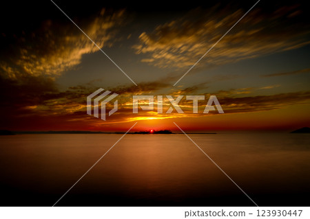 Sunset in the sea 123930447