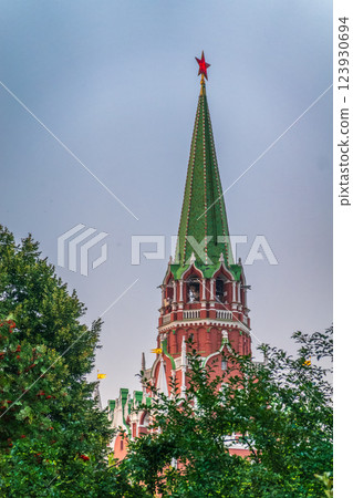 Troitskaya tower of Moscow Kremlin on a blue sky background in sunny summer day 123930694