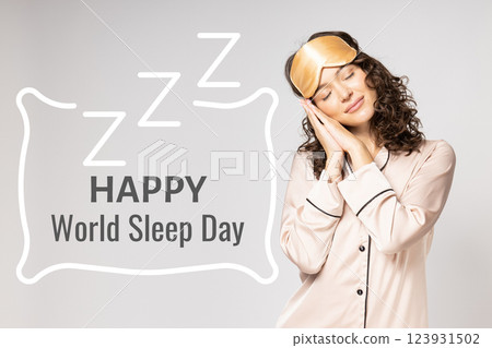 World Sleep Day, sleeping woman stands in pajamas on a light background, with text World Sleep Day, sleeping woman stands in pajamas on a light background, with text 123931502