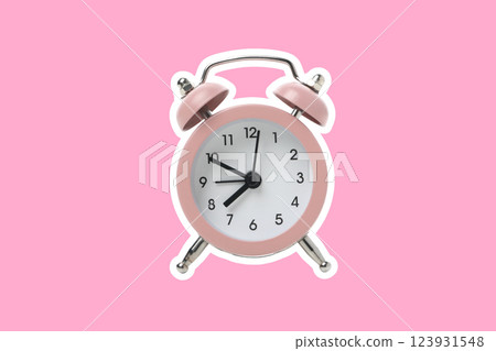 Spring Forward. Pink alarm clock on a pink background. Spring Forward. Pink alarm clock on a pink background. 123931548