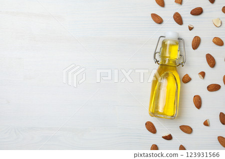 Skin care and body care concept - almonds, almond oil 123931566